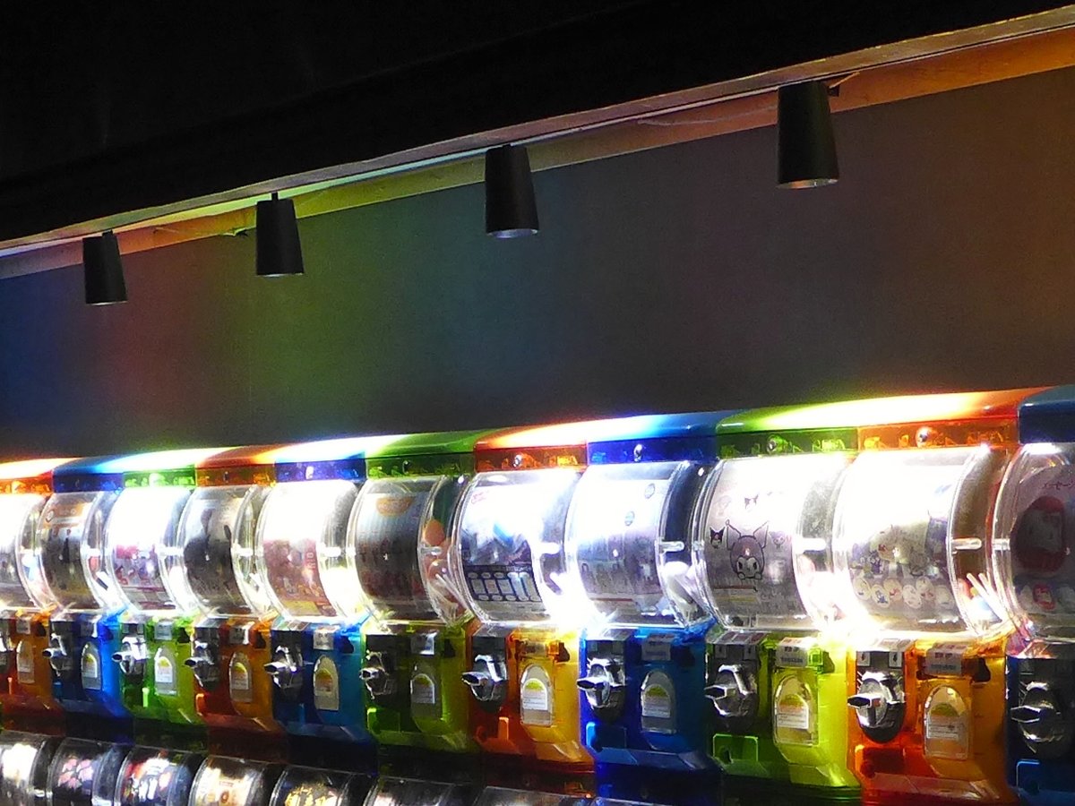 Rows of gashapon capsule machines at a specialist store