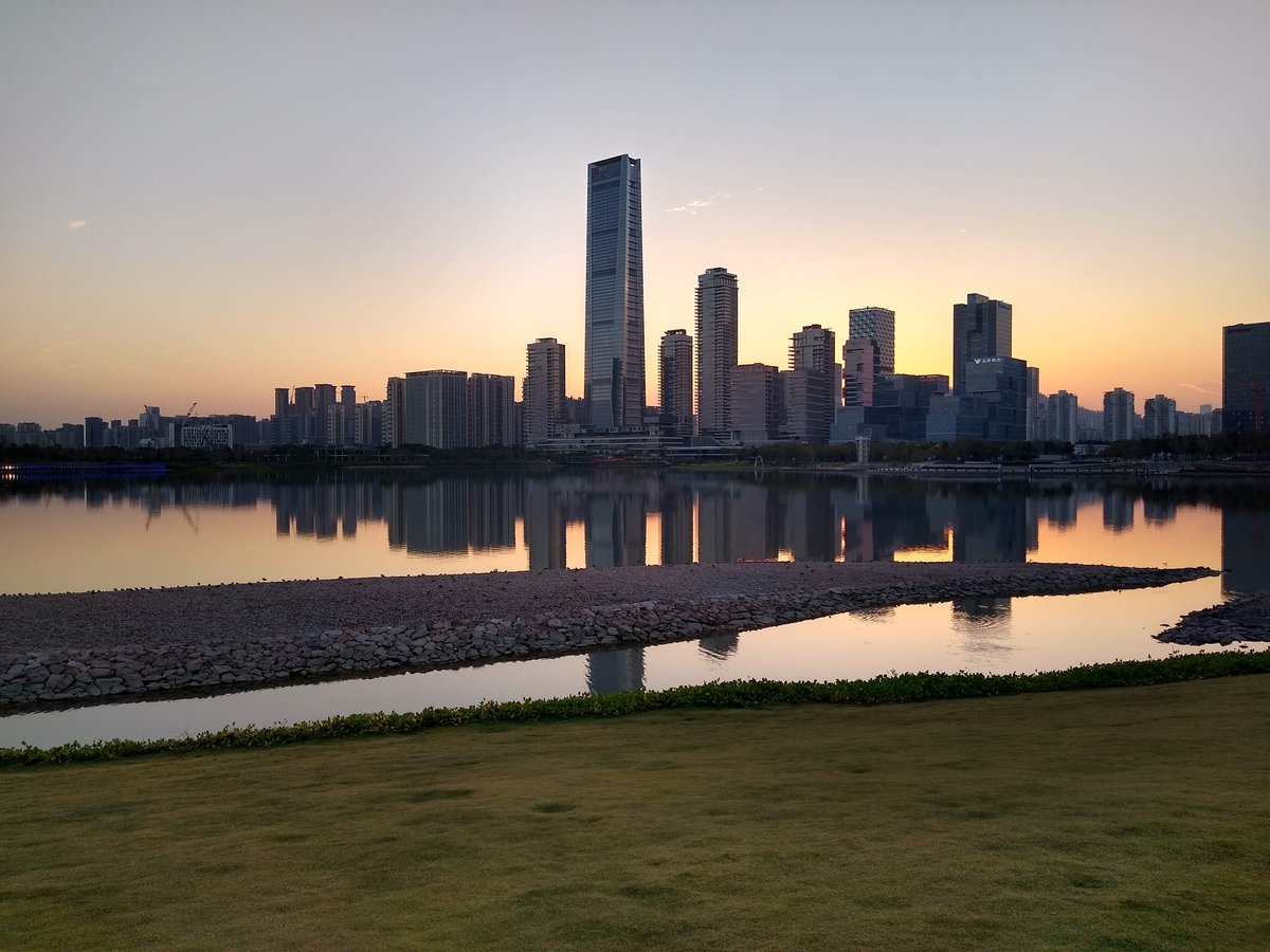 Sunset on the Shenzhen Bay waterfront with the Houhai skyline behind